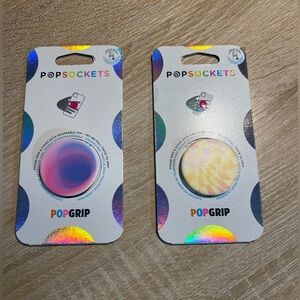 Two Popsockets: One Purple And Pink And One Yellow And Pink (E)